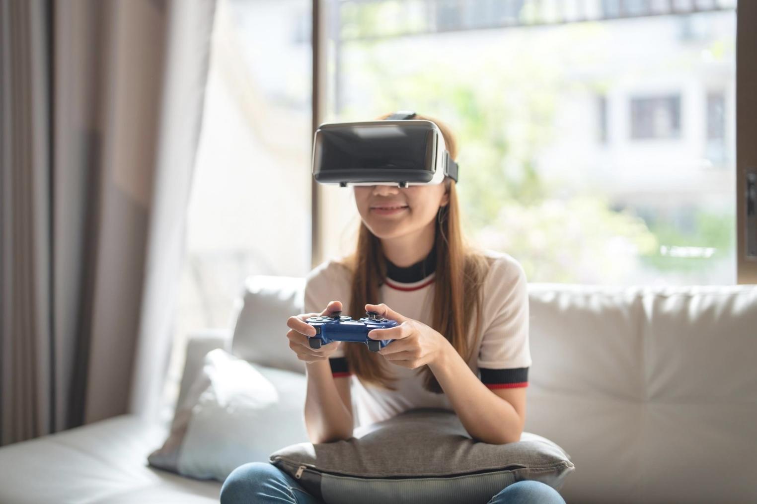 Students working on VR headset integration with game development workstations